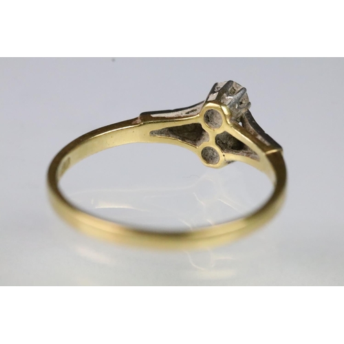 58 - Art Deco 18ct gold and diamond ring. The ring set with two round brilliant cut diamonds to the head ... 