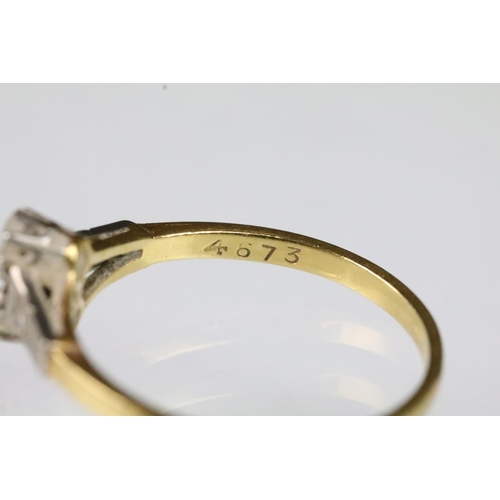 58 - Art Deco 18ct gold and diamond ring. The ring set with two round brilliant cut diamonds to the head ... 