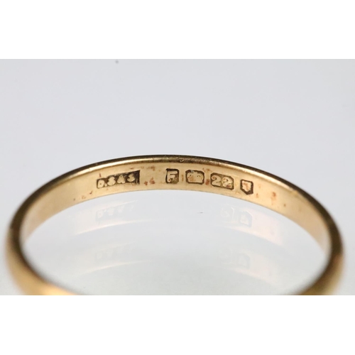 59 - 22ct gold wedding band ring. The ring of plain D form. Hallmarked London 1941. Size R.