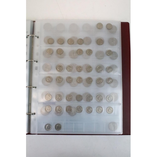 236 - A very large collection of mixed World coins in alphabetical order within six collectors albums.