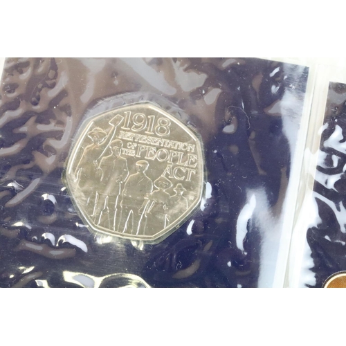 208 - A Royal Mint United Kingdom A-Z 10p coin collection together with a Beatrix Potter 50p coin set and ... 