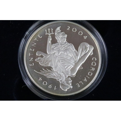 227 - Two Royal Mint United Kingdom Queen Elizabeth II silver proof crown coins to include the 2000 Millen... 