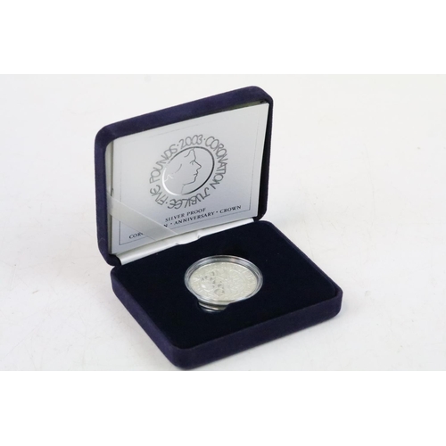 234 - A collection of three Royal Mint United Kingdom Queen Elizabeth II silver proof commemorative £5 / C... 