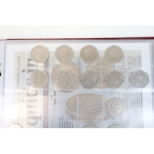 239 - A large collection of British decimal 50p, £2 and £5 collectors coins contained within two albums to... 