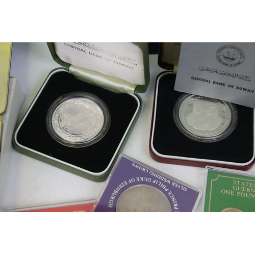 242 - A collection of mainly uncirculated coins to include Kuwait silver examples, First decimal sets, cro... 