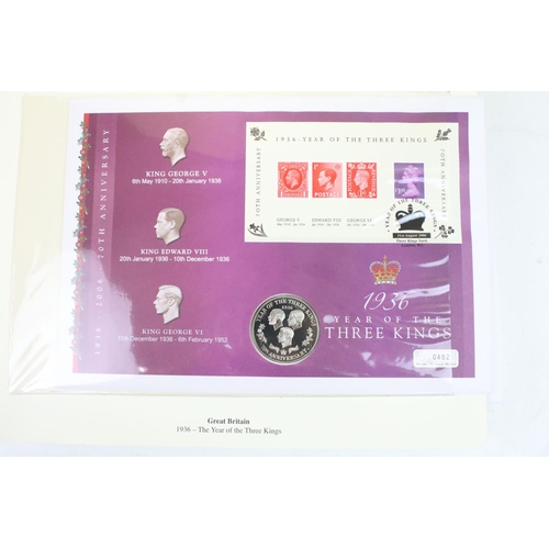 244 - A large collection of Stamp / Coin covers contained within four albums to include some silver exampl... 