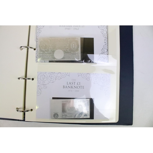 244 - A large collection of Stamp / Coin covers contained within four albums to include some silver exampl... 