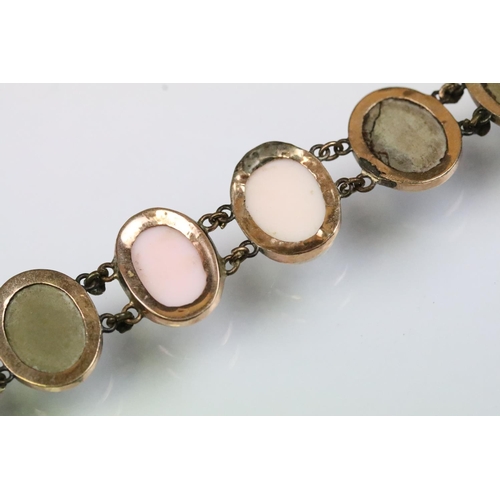 9 - 19th Century lava cameo bracelet. The bracelet set with moulded lava cameos depicting classical fema... 