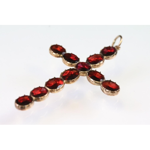 12 - 19th Century garnet cross pendant being set throughout with oval flat cut garnets set within a yello... 