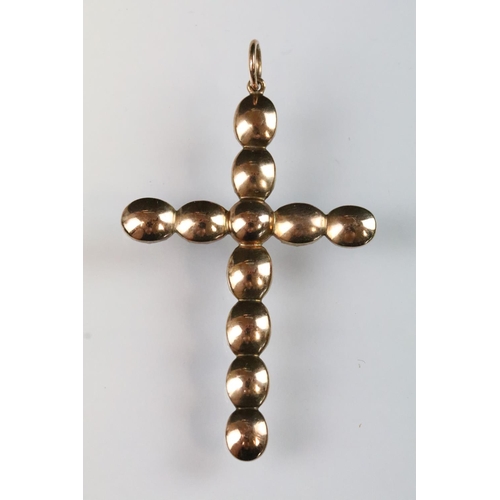 12 - 19th Century garnet cross pendant being set throughout with oval flat cut garnets set within a yello... 