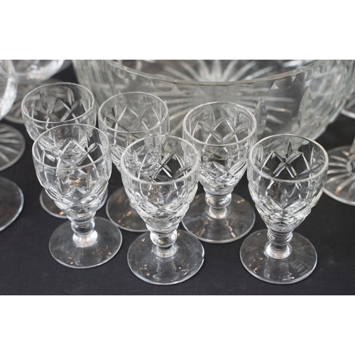 72 - Large selection of cut glass with decanters including two square cut, one round and a ship decanter ... 