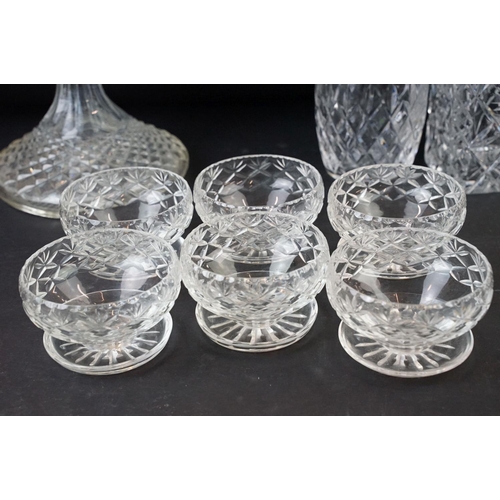 72 - Large selection of cut glass with decanters including two square cut, one round and a ship decanter ... 