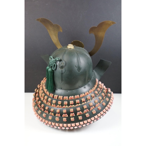 100 - Japanese Samurai helmet suit of armour replica with colourful cotton thread weaving on mount stand.