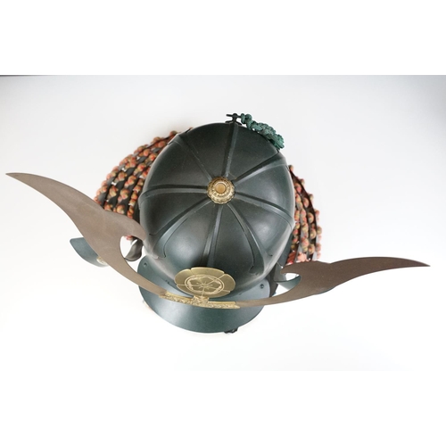 100 - Japanese Samurai helmet suit of armour replica with colourful cotton thread weaving on mount stand.