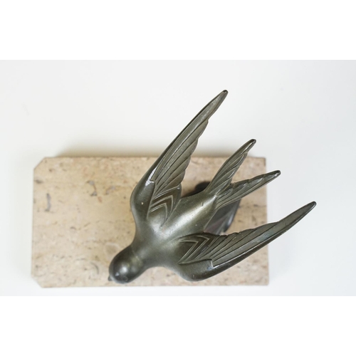 110 - Pair of Art Deco marble bookends mounted with stylised spelter birds (one bird a/f), each 15cm long