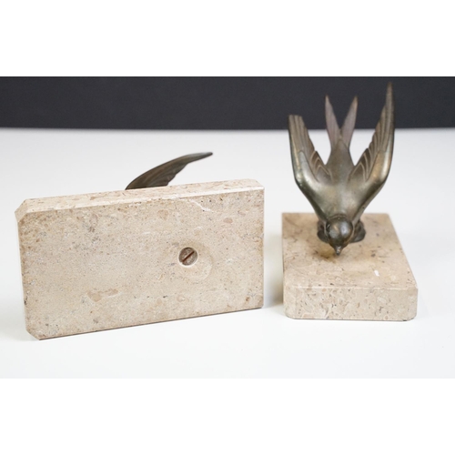110 - Pair of Art Deco marble bookends mounted with stylised spelter birds (one bird a/f), each 15cm long