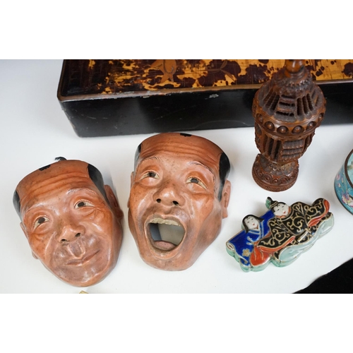 117 - Assortment of oriental items to include a set of eight Japanese wooden miniature character masks and... 