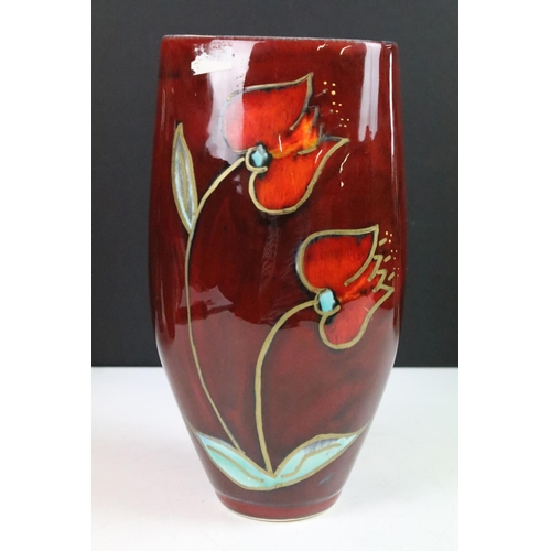 17 - Trio of Anita Harris AHS abstract red glaze pottery vases with floral hand painted decoration and a ... 