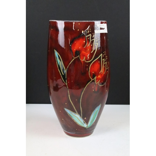 17 - Trio of Anita Harris AHS abstract red glaze pottery vases with floral hand painted decoration and a ... 