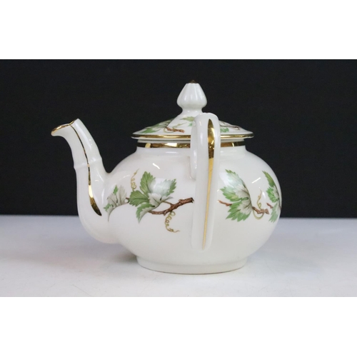 22 - J.Chomette & Son Ltd French stack infuser teapot with side handle decorated with a foliage design an... 