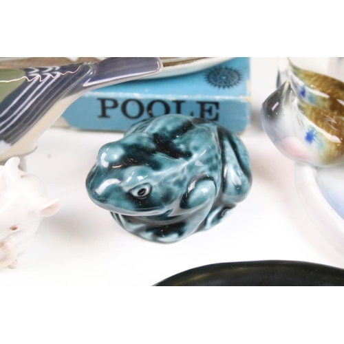 39 - Poole pottery assortment of birds and woodland animals together with teal glazed seated cats and fro... 