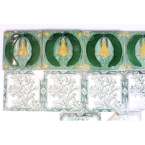 65 - Art Nouveau decorative fireplace tiles, six green and white floral pattern and four in deep green fo... 