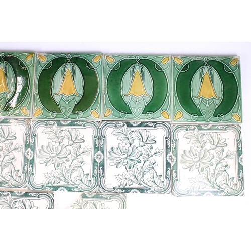 65 - Art Nouveau decorative fireplace tiles, six green and white floral pattern and four in deep green fo... 