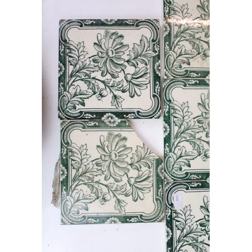 65 - Art Nouveau decorative fireplace tiles, six green and white floral pattern and four in deep green fo... 