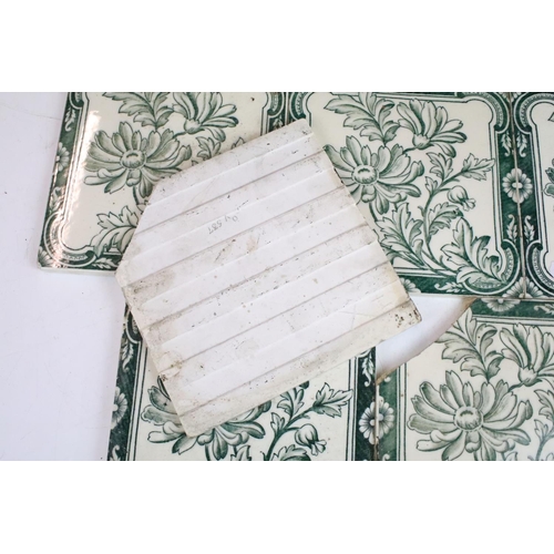 65 - Art Nouveau decorative fireplace tiles, six green and white floral pattern and four in deep green fo... 