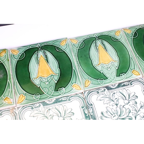 65 - Art Nouveau decorative fireplace tiles, six green and white floral pattern and four in deep green fo... 