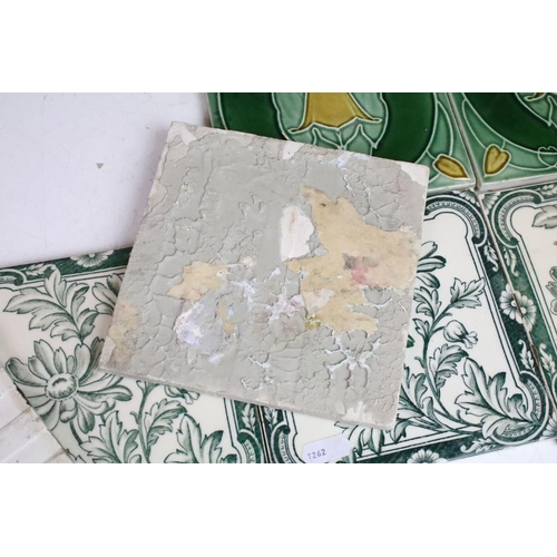 65 - Art Nouveau decorative fireplace tiles, six green and white floral pattern and four in deep green fo... 