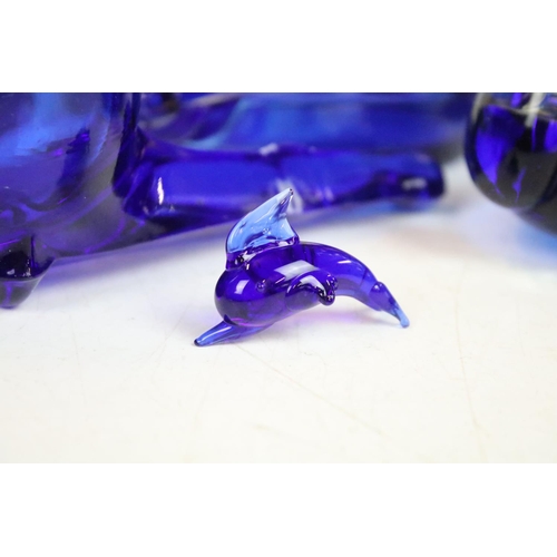 66 - Selection of blue glass decorative items to include atomiser perfume bottle, scent bottles, swan, pi... 