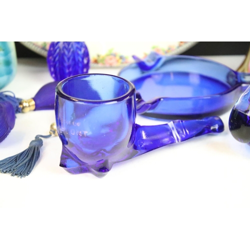 66 - Selection of blue glass decorative items to include atomiser perfume bottle, scent bottles, swan, pi... 