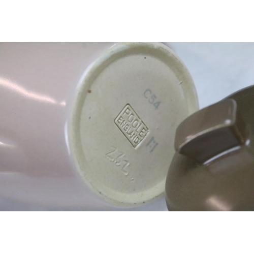 68 - Mid century Poole Pottery two tone coffee set comprising two coffee pots, six coffee cups and six sa... 