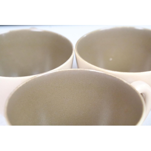 68 - Mid century Poole Pottery two tone coffee set comprising two coffee pots, six coffee cups and six sa... 