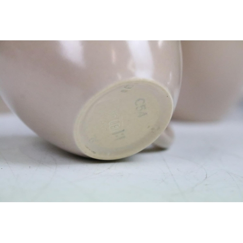 68 - Mid century Poole Pottery two tone coffee set comprising two coffee pots, six coffee cups and six sa... 