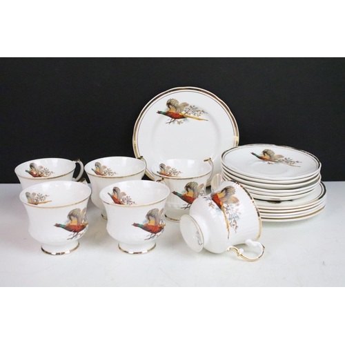 69 - Six Staffordshire Sheridan pheasant design trios along with a selection of Carlton ware floral items... 