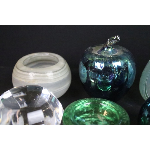 71 - Assortment of coloured glass paperweights and decorative glass vases