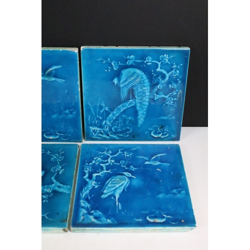 75 - Six Minton aesthetic period tiles. Overall teal glaze, each design featuring a bird scene, unmarked.