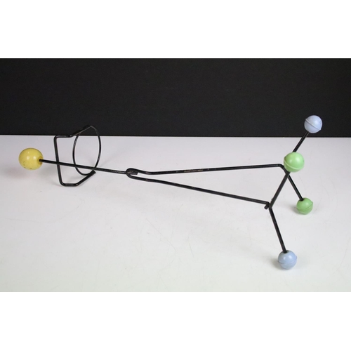 85 - Mid century retro atomic plant holder in the form of a man with coloured ball finials, 49cm high