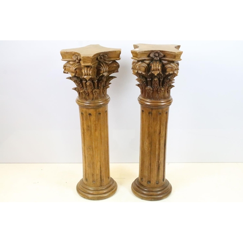 523 - Pair of carved wooden Corinthian columns, each 101.5cm high