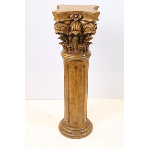 523 - Pair of carved wooden Corinthian columns, each 101.5cm high