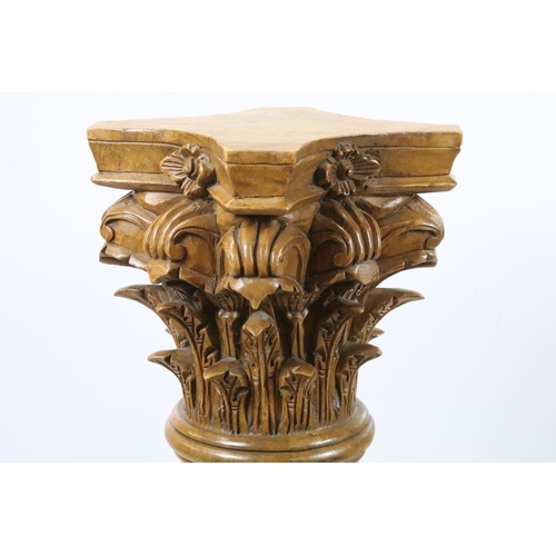 523 - Pair of carved wooden Corinthian columns, each 101.5cm high