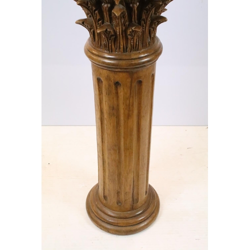 523 - Pair of carved wooden Corinthian columns, each 101.5cm high