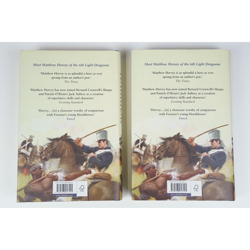 292 - Two hard back cover copies of Warrior by Allan Mallinson, both signed by the author.