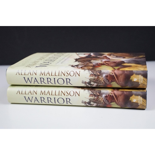 292 - Two hard back cover copies of Warrior by Allan Mallinson, both signed by the author.