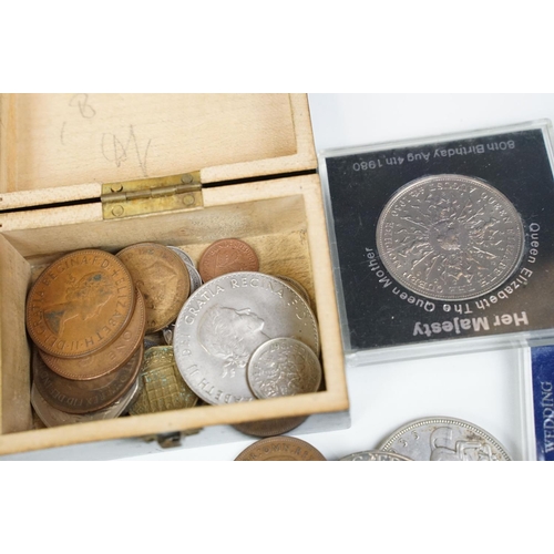 298 - Small groups of coins including commemorative crowns together with two albums of stamps.