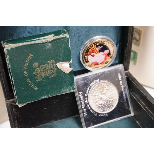 298 - Small groups of coins including commemorative crowns together with two albums of stamps.