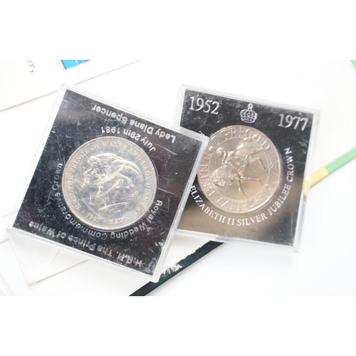 298 - Small groups of coins including commemorative crowns together with two albums of stamps.