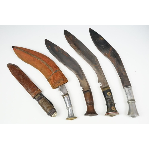 299 - Selection of five 20th century Kukri knives with steel blades.